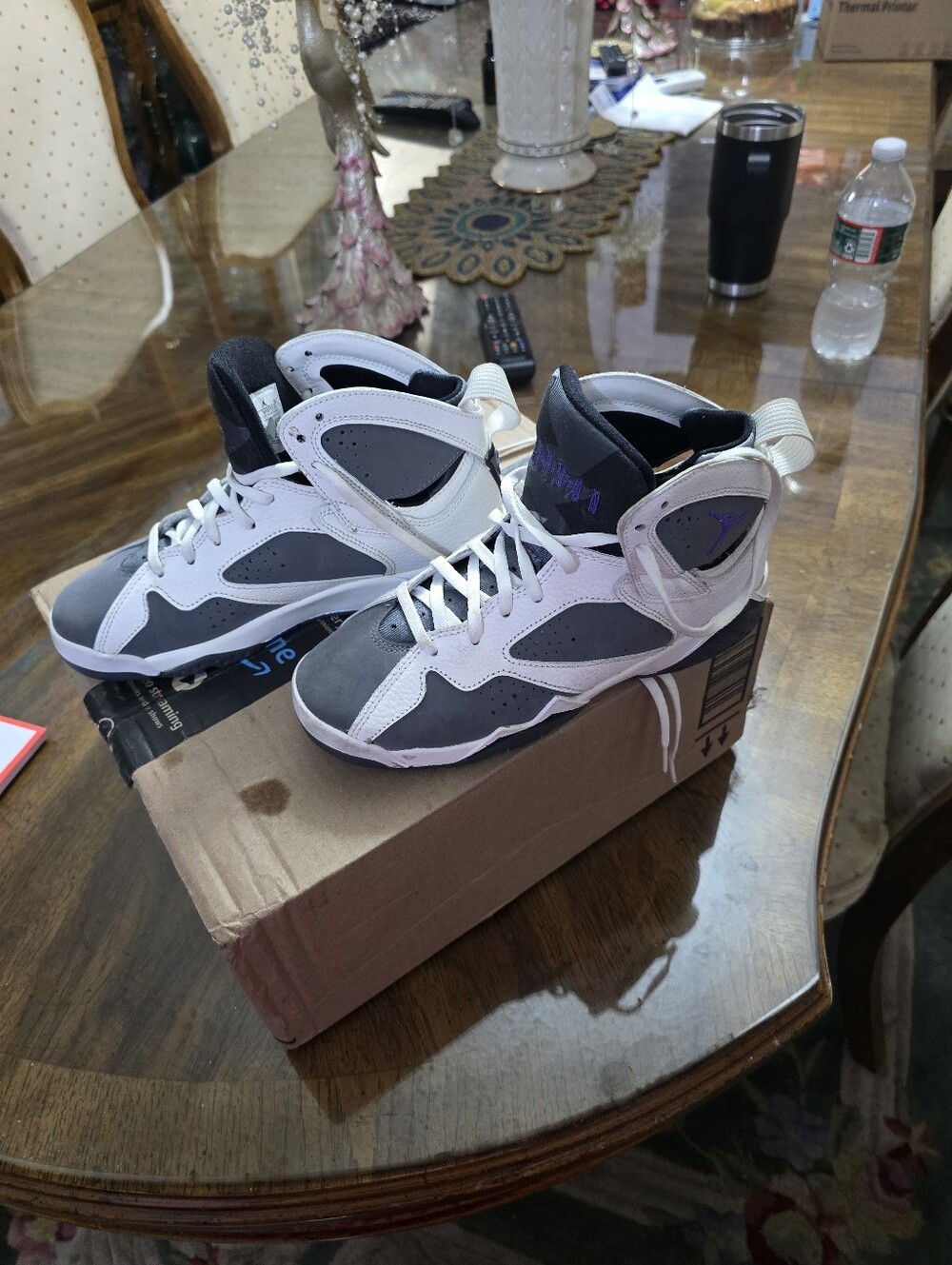 Air Jordan 7 Retro Flint High-Top Athletic Sneakers in White and Gray